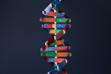 Photo of One DNA structure model on dark background