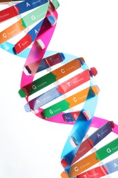 Photo of Colorful DNA structure model on white background