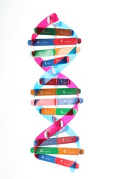 Photo of Colorful DNA structure model on white background