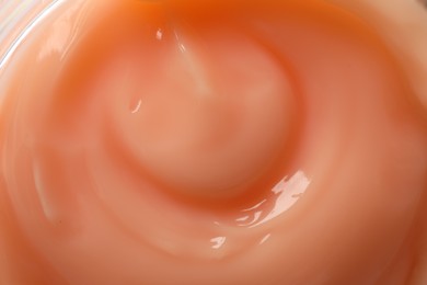 Photo of Sample of cosmetic product as background, closeup