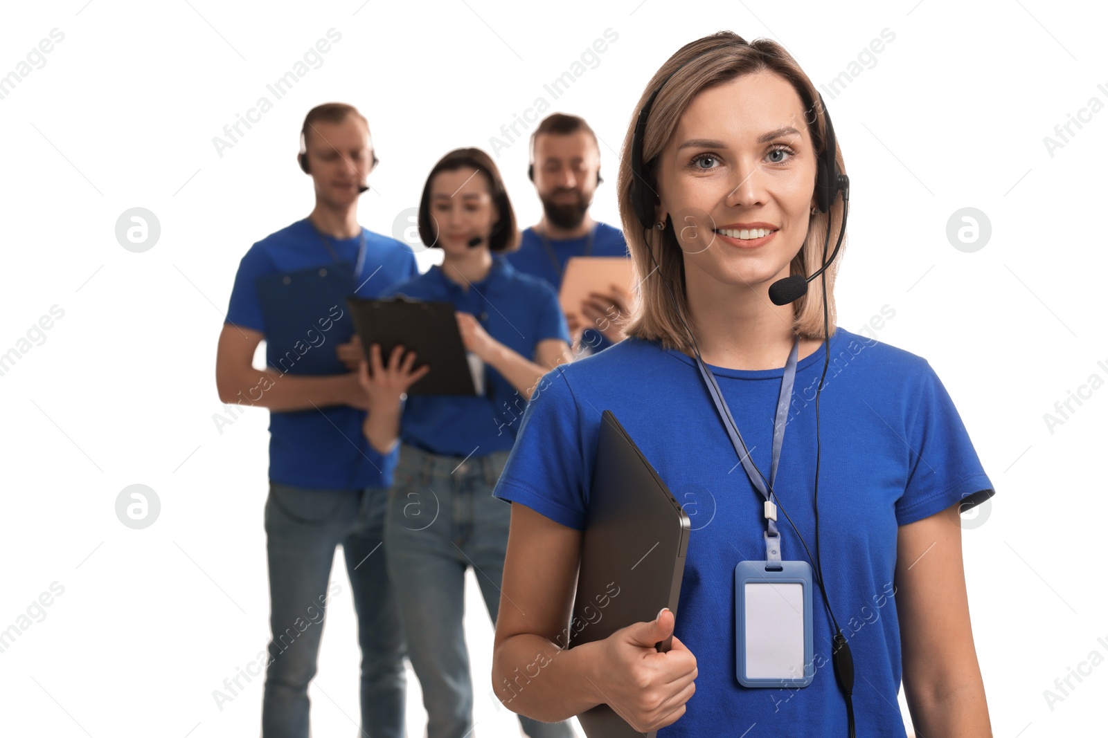 Photo of Technical support call center. Team of friendly operators on white background