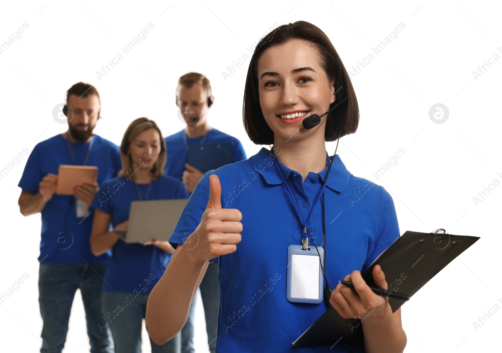 Photo of Technical support call center. Team of friendly operators on white background