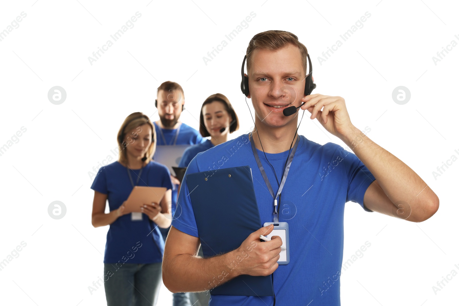 Photo of Technical support call center. Team of friendly operators on white background