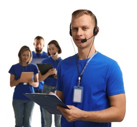 Technical support call center. Team of friendly operators on white background