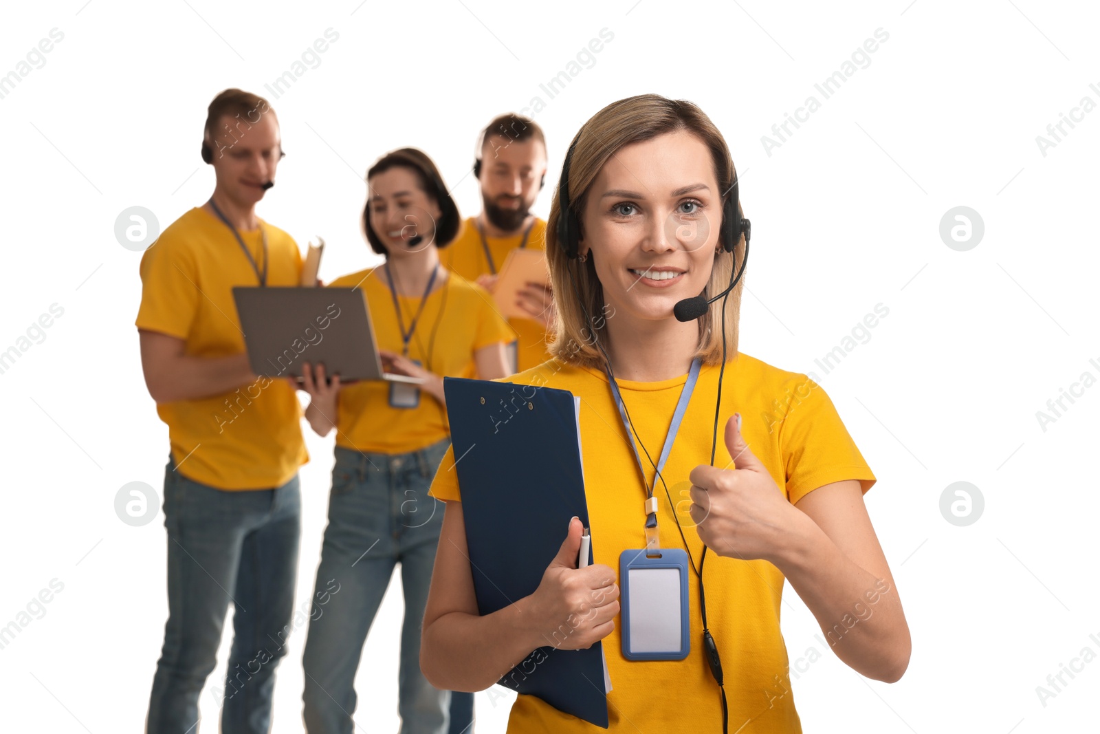 Photo of Technical support call center. Team of friendly operators on white background