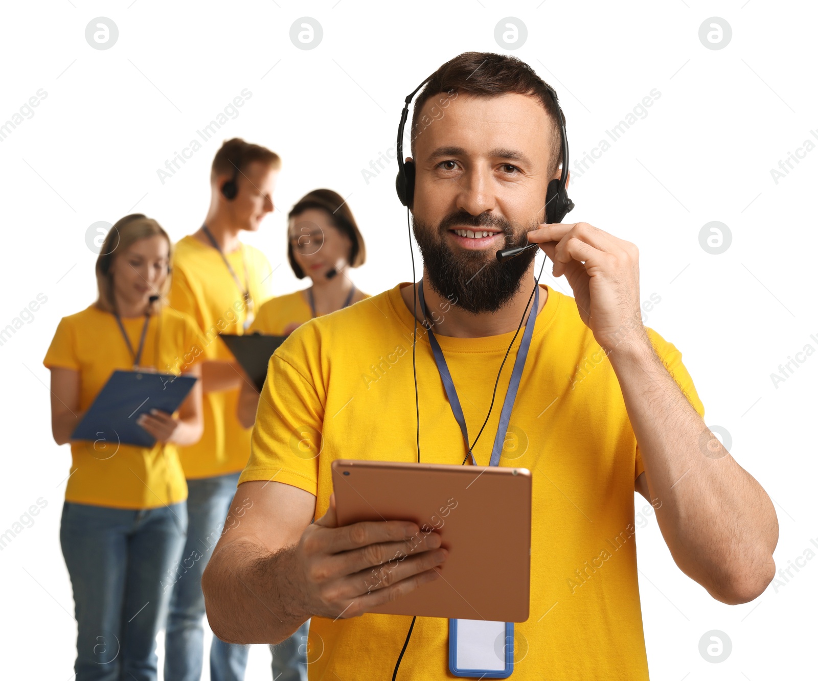 Photo of Technical support call center. Team of friendly operators on white background