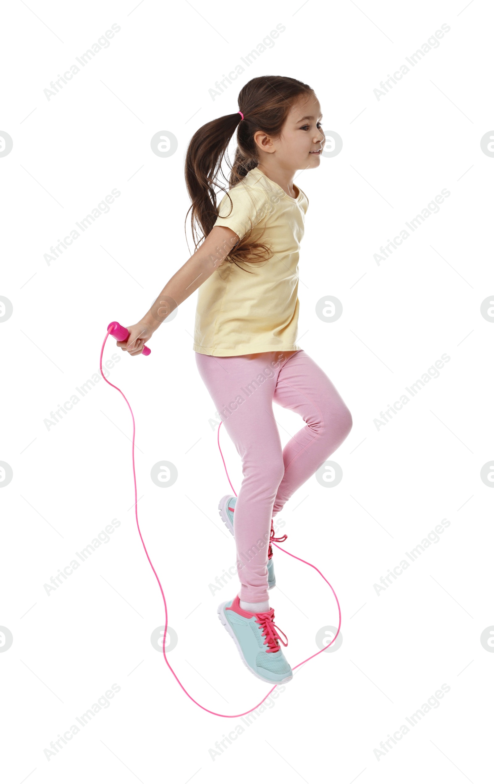 Photo of Cute little girl with jump rope on white background