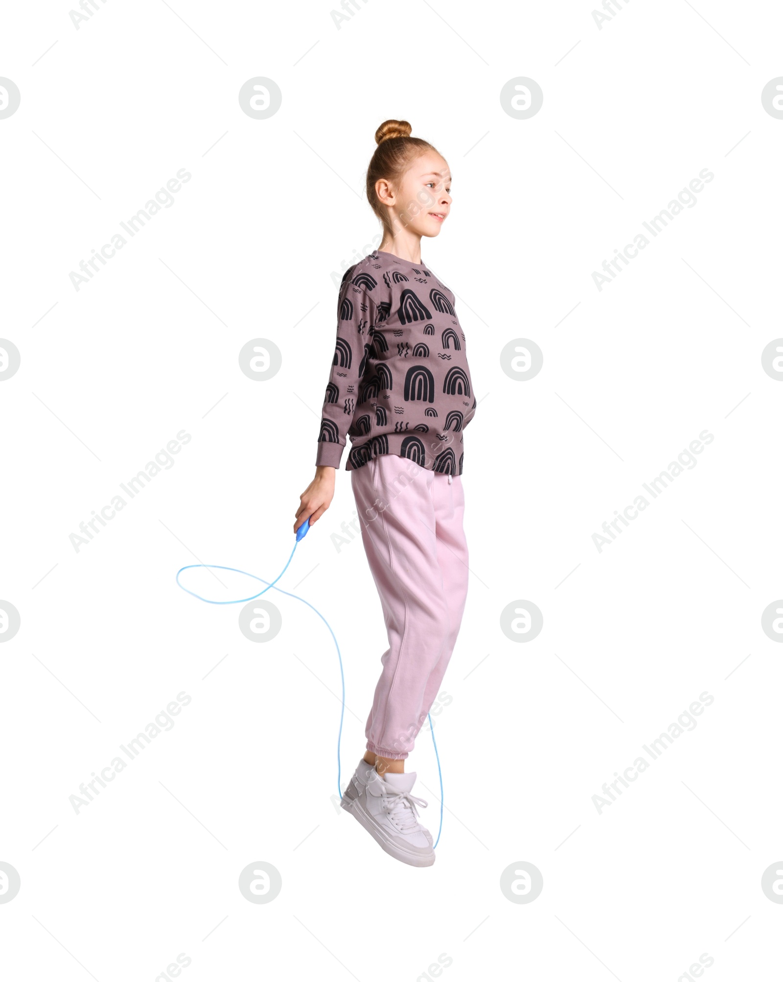 Photo of Cute little girl with jump rope on white background