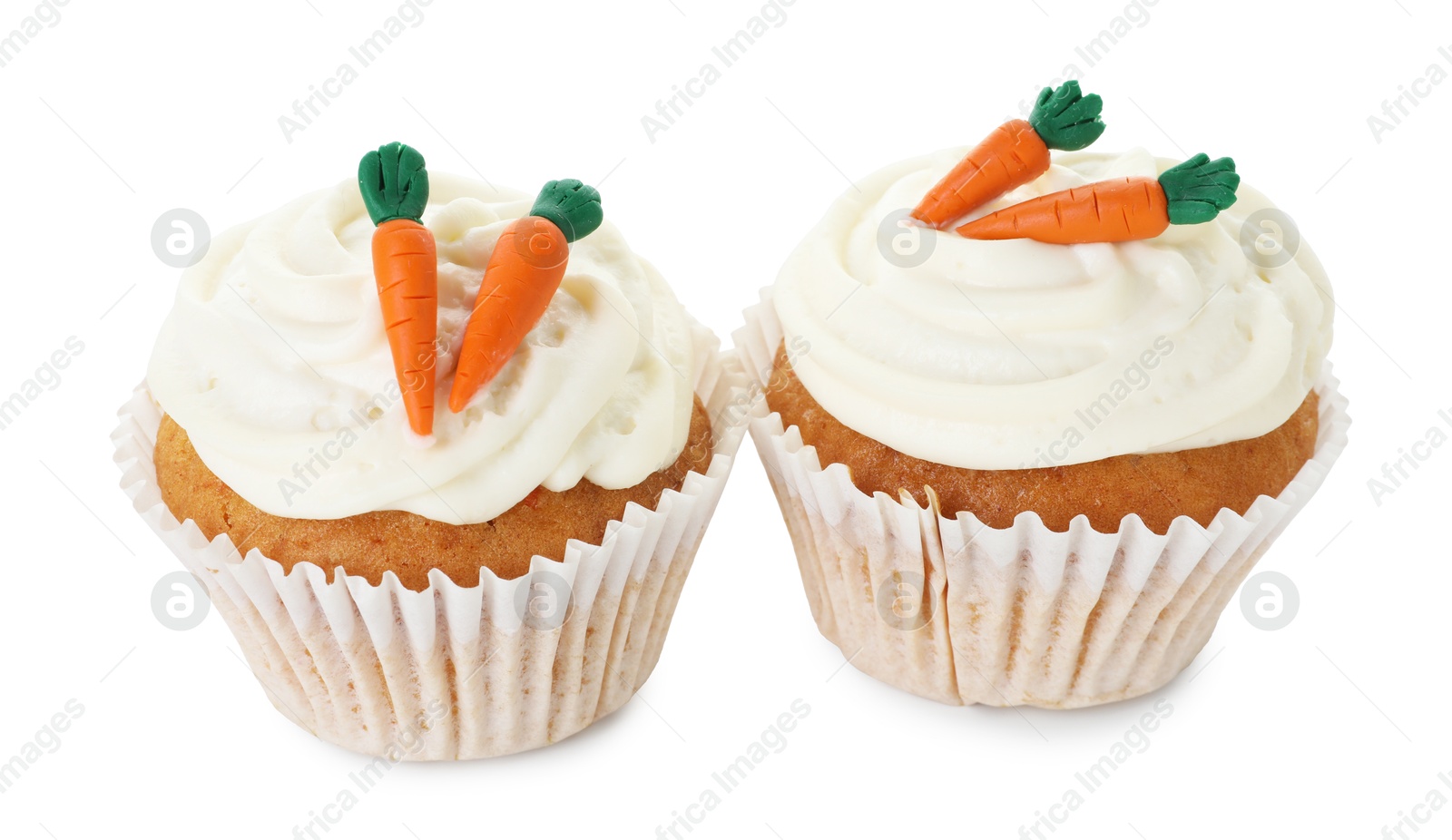 Photo of Delicious carrot cupcakes isolated on white. Yummy dessert