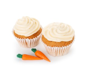 Photo of Delicious carrot cupcakes isolated on white. Yummy dessert