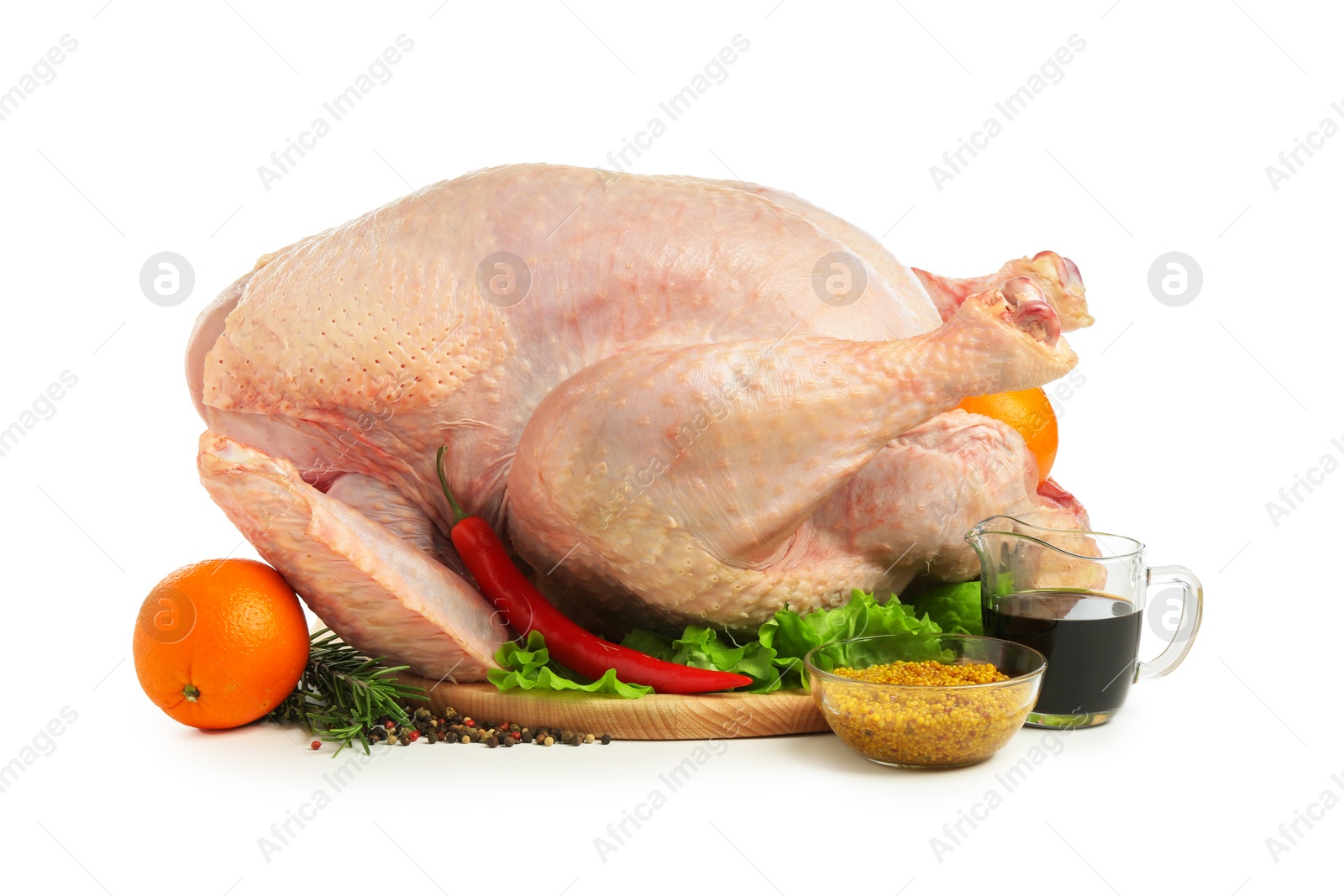 Photo of Whole raw turkey and ingredients isolated on white