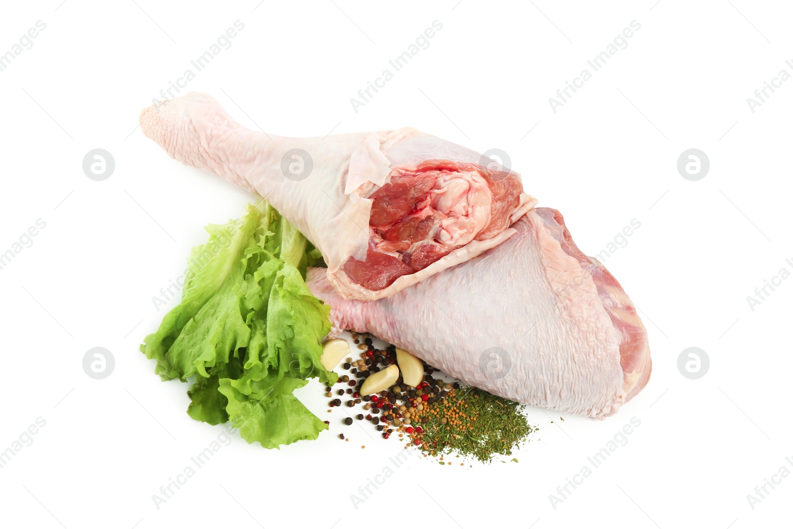 Photo of Raw turkey drumsticks and spices isolated on white, top view