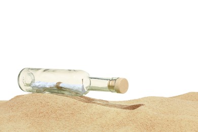 Photo of Rolled letter in corked glass bottle on sand against white background