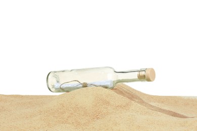 Photo of Rolled letter in corked glass bottle on sand against white background