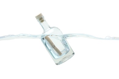 Photo of Corked glass bottle with rolled letter in water on white background