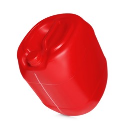 Photo of One red plastic canister in air on white background