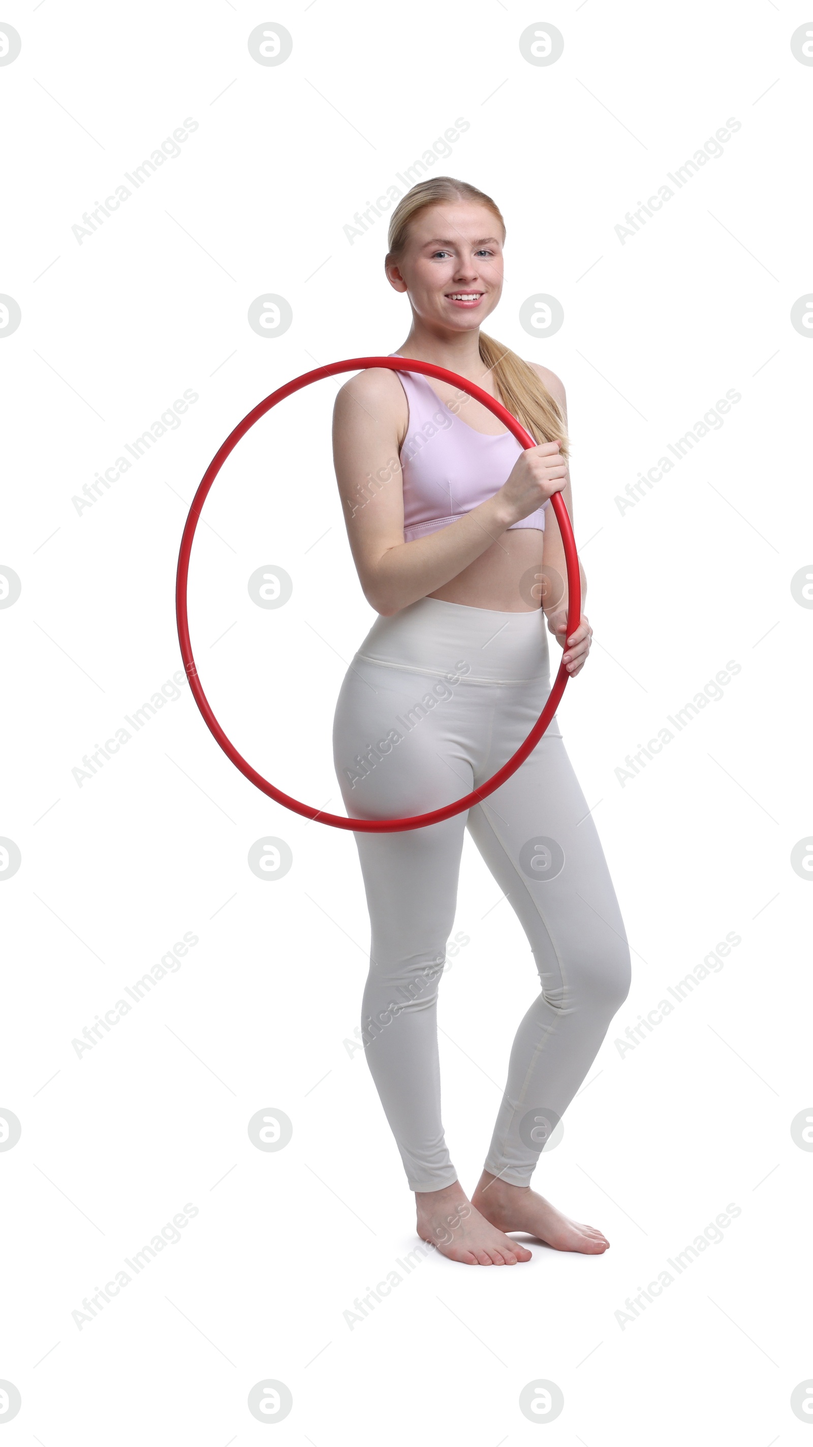 Photo of Beautiful young woman with hula hoop isolated on white