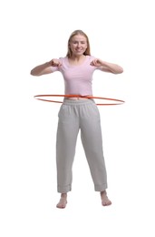 Photo of Beautiful young woman exercising with hula hoop on white background