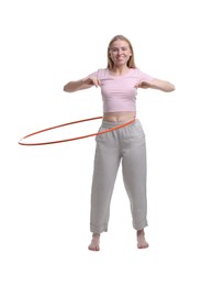 Photo of Beautiful young woman exercising with hula hoop on white background