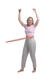 Photo of Beautiful young woman exercising with hula hoop on white background