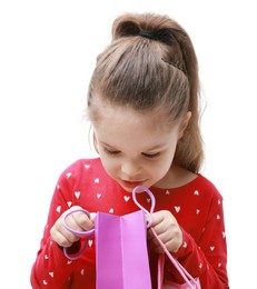 Cute little girl with shopping bag on white background