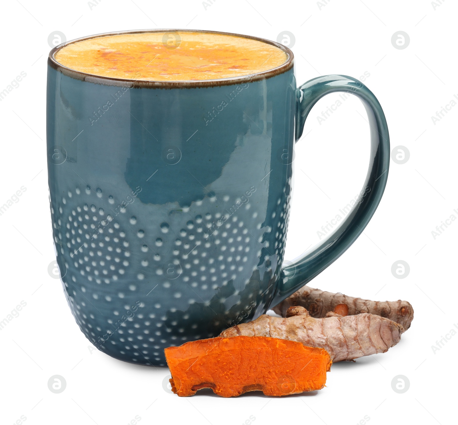 Photo of Tasty turmeric latte in cup and roots isolated on white