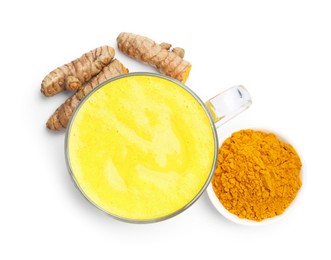 Photo of Tasty turmeric latte in cup, powder and roots isolated on white, top view