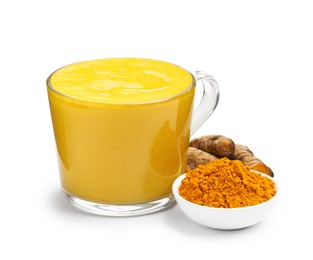 Tasty turmeric latte in cup, powder and roots isolated on white