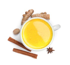 Photo of Tasty turmeric latte in cup and spices isolated on white, top view