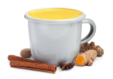 Photo of Tasty turmeric latte in cup and spices isolated on white