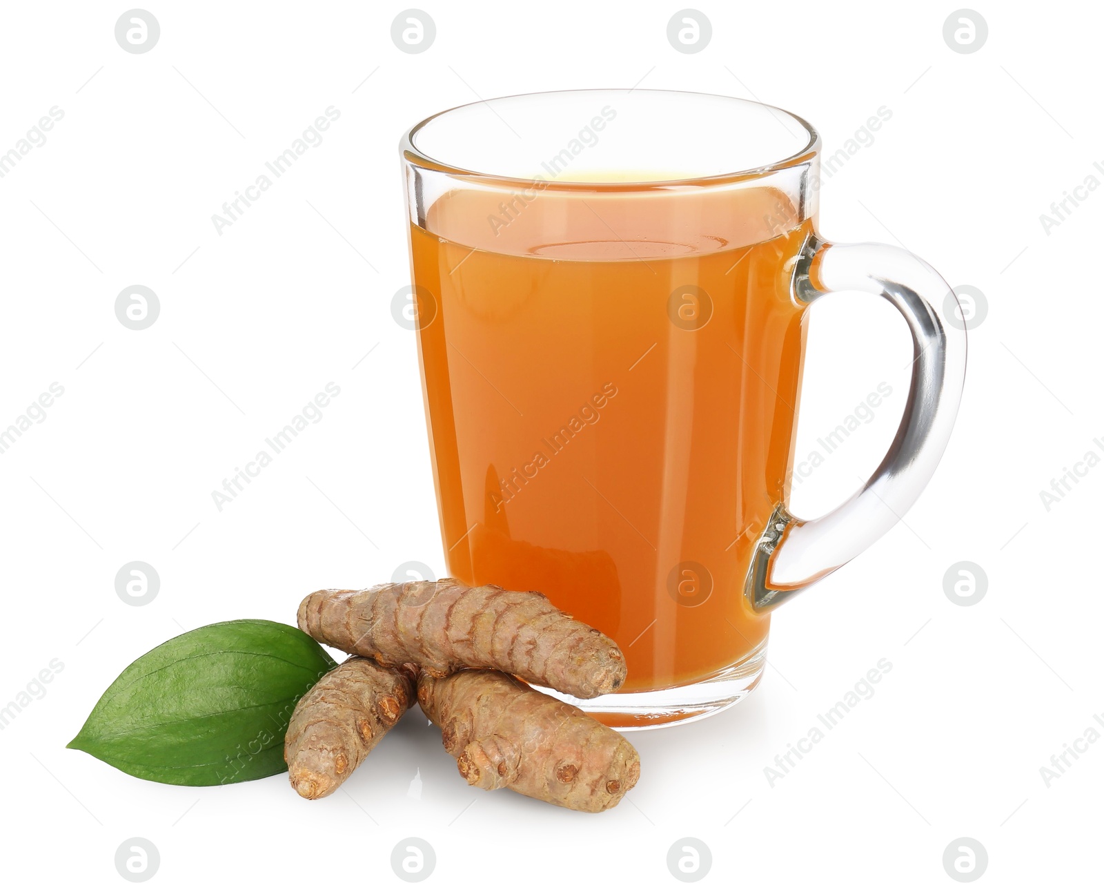 Photo of Aromatic turmeric tea in glass cup, roots and green leaf isolated on white