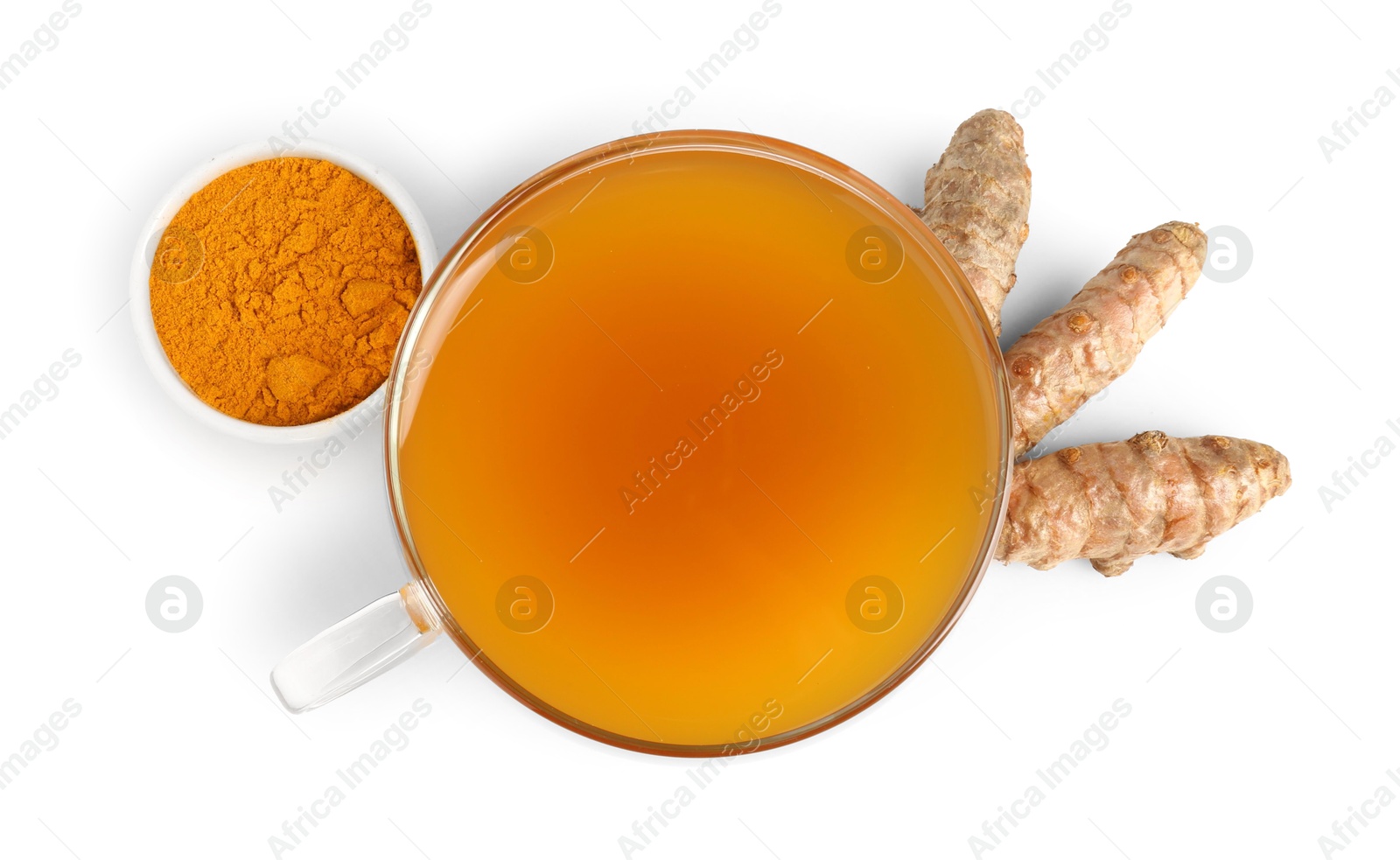 Photo of Aromatic turmeric tea in glass cup, roots and powder isolated on white, top view