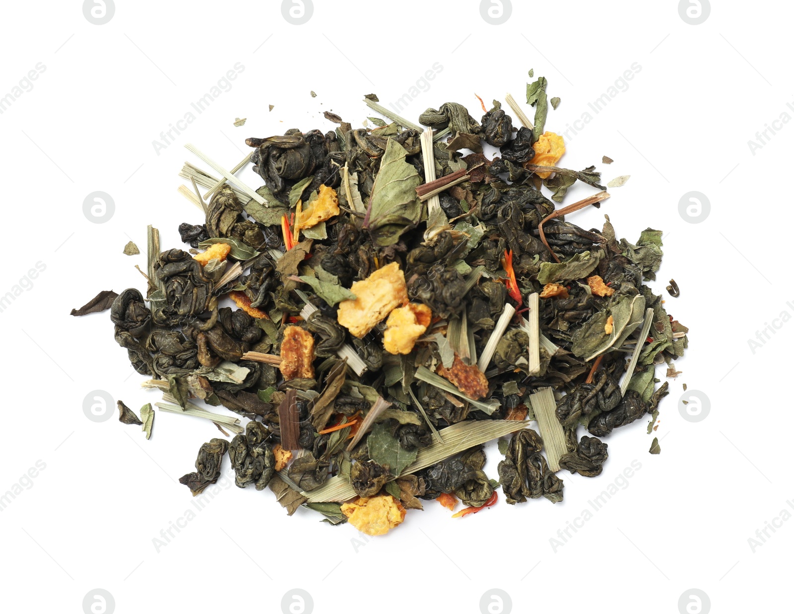 Photo of Pile of dry tea leaves isolated on white, top view