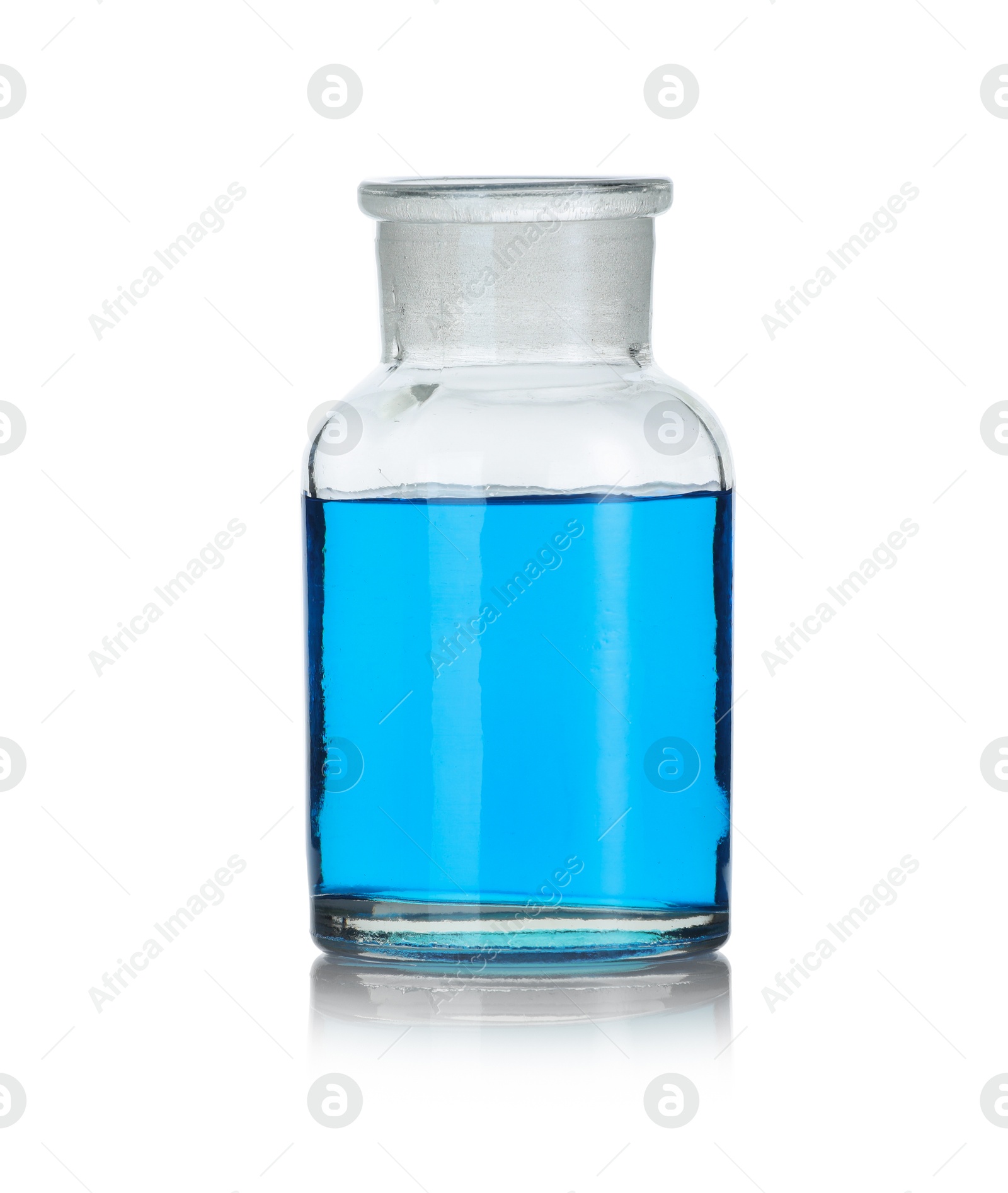 Photo of Glass flask with light blue liquid on mirror surface against white background