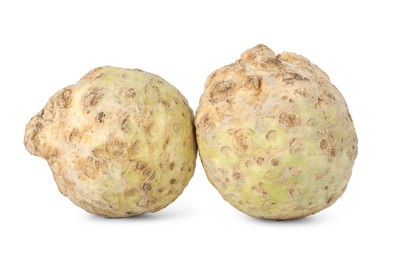 Photo of Two fresh celery roots isolated on white