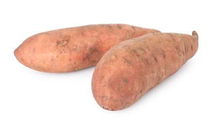 Photo of Fresh sweet potatoes isolated on white. Vegetable root