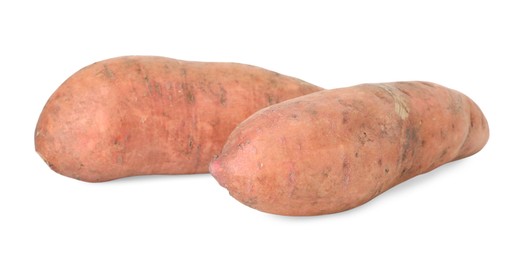 Photo of Fresh sweet potatoes isolated on white. Vegetable root