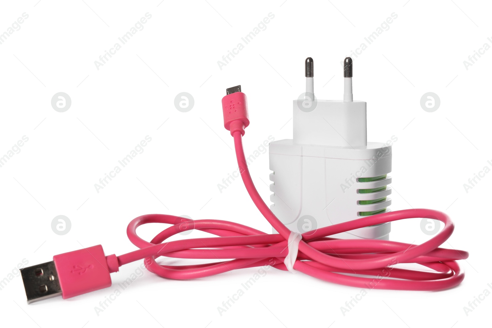 Photo of USB power adapter and charge cable isolated on white