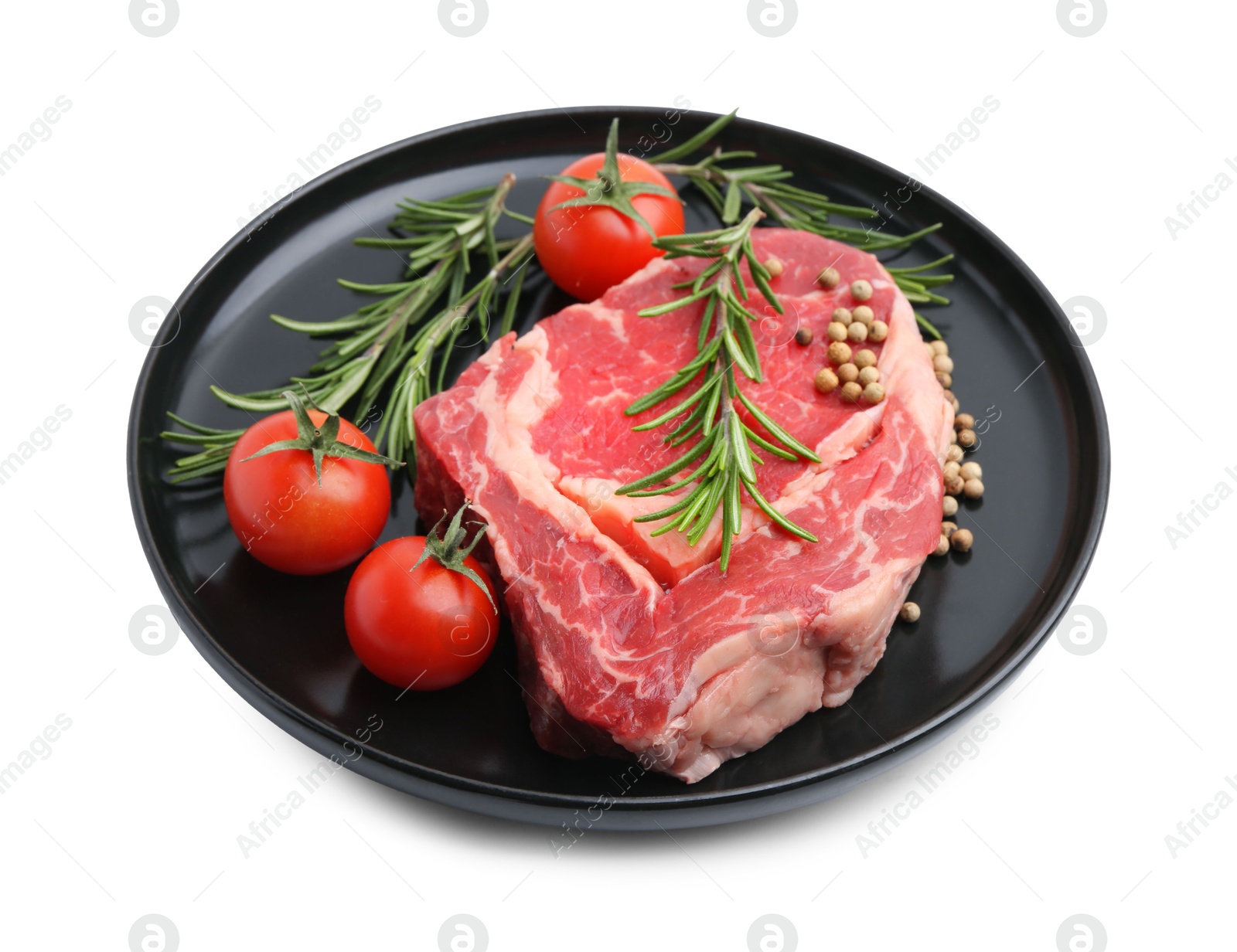 Photo of Piece of raw beef meat, spices and tomatoes isolated on white