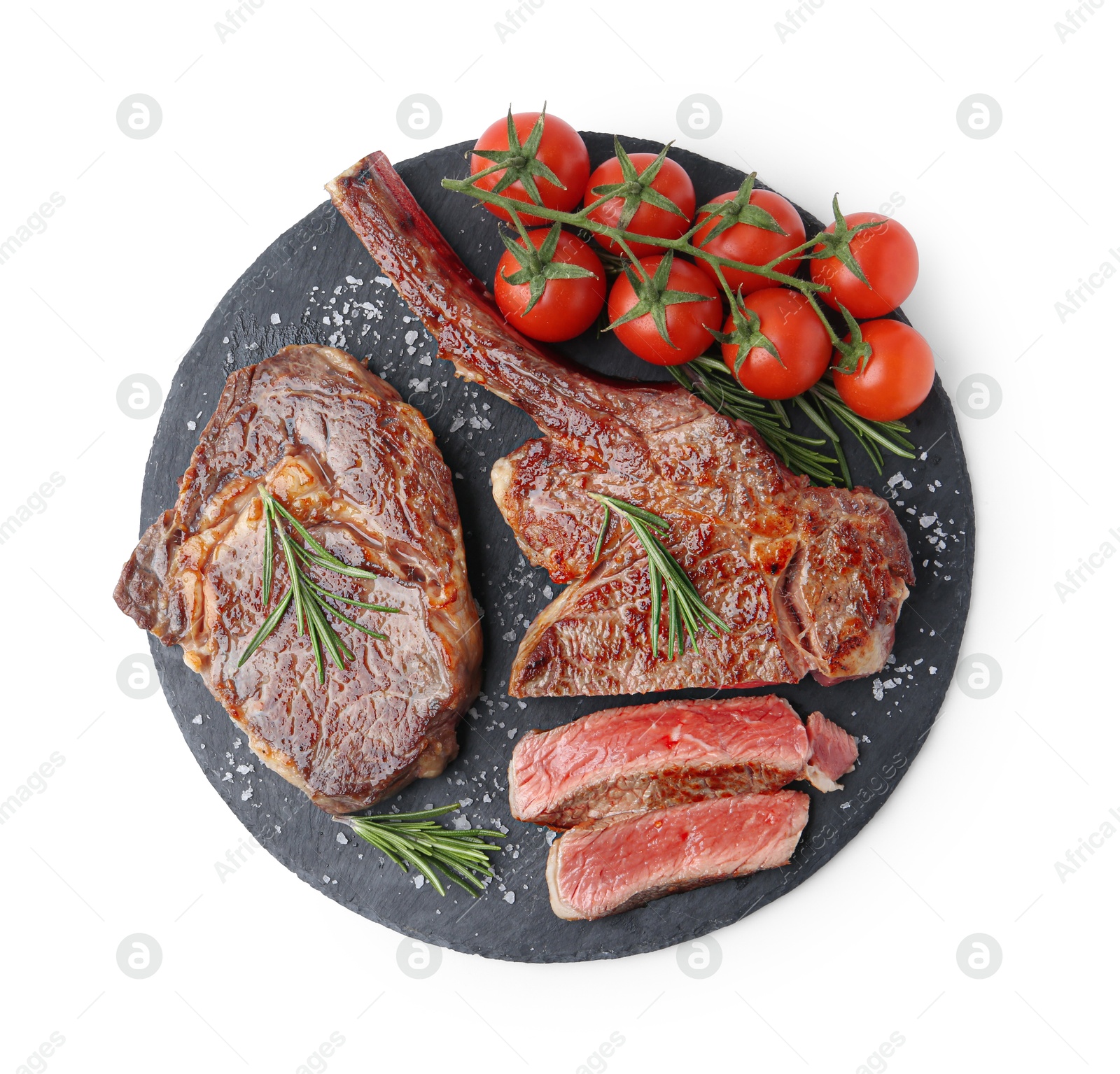 Photo of Pieces of delicious beef meat, spices and tomatoes isolated on white, top view