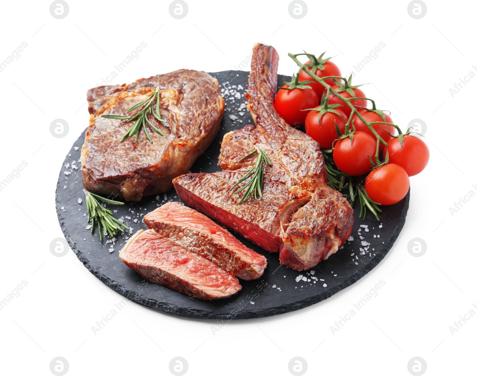 Photo of Pieces of delicious beef meat, spices and tomatoes isolated on white