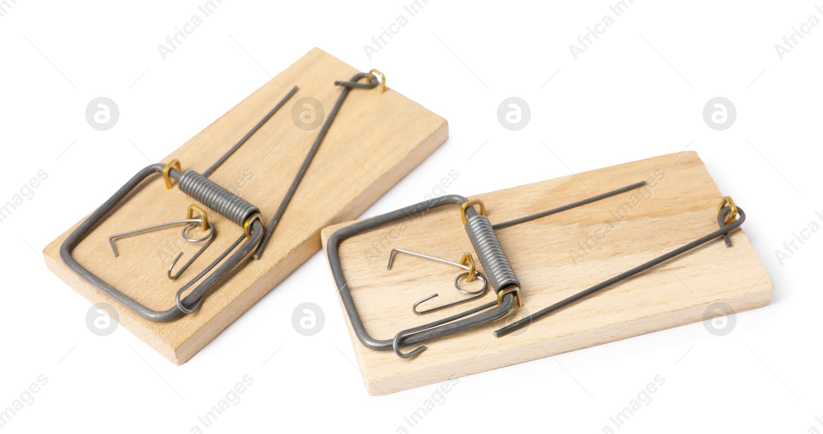 Photo of Two spring-loaded bar mousetraps isolated on white