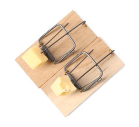 Photo of Two spring-loaded bar mousetraps with pieces of cheese isolated on white, top view