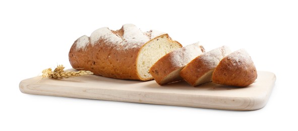 Photo of Wooden cutting board with fresh bread and spikes isolated on white