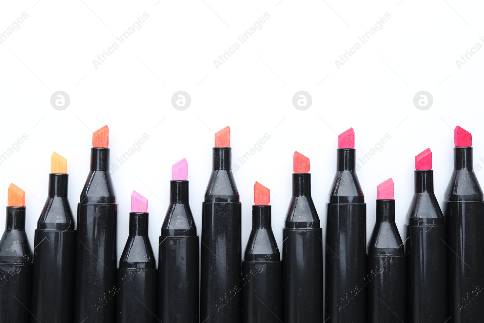 Photo of Many colorful markers on white background, top view