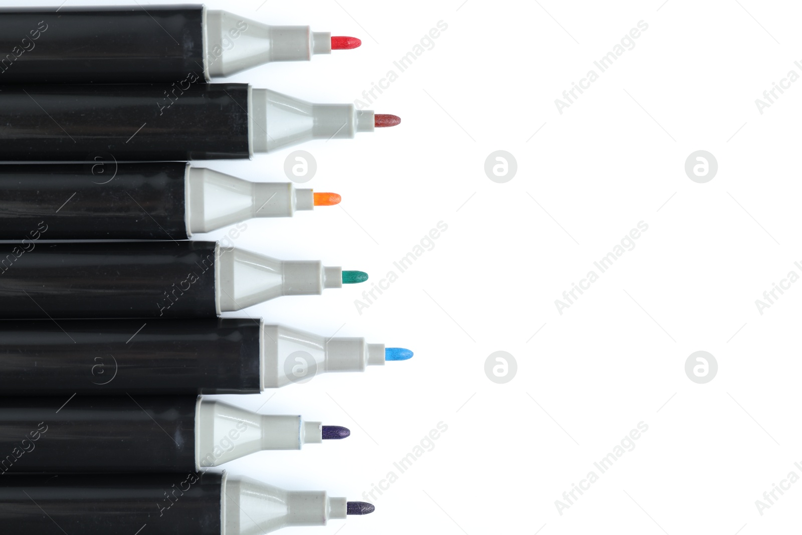 Photo of Many colorful markers on white background, top view