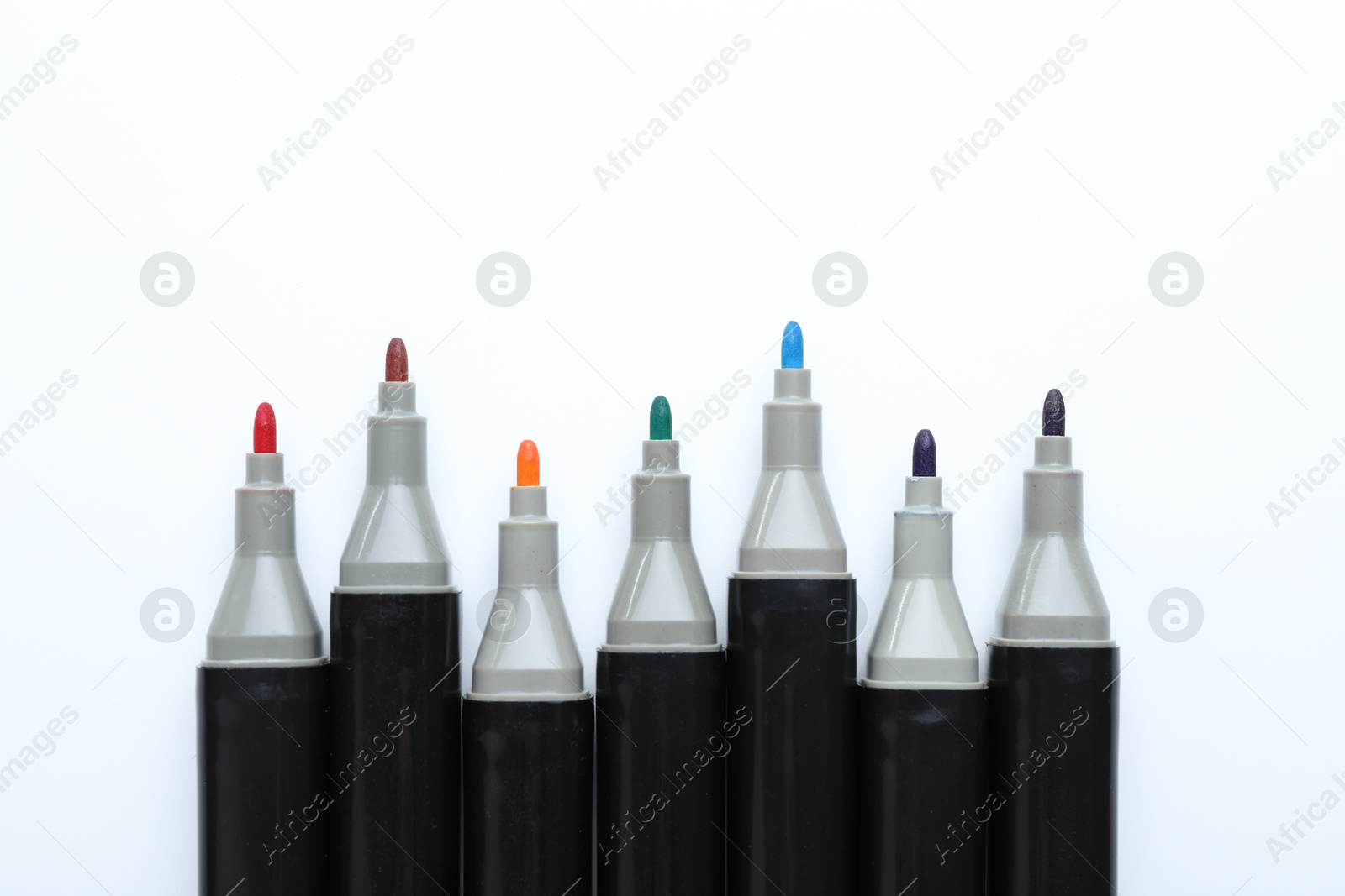 Photo of Many colorful markers on white background. Art supplies