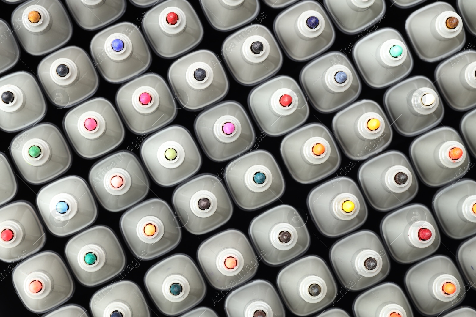 Photo of Many colorful markers as background, top view