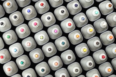 Photo of Many colorful markers as background, top view