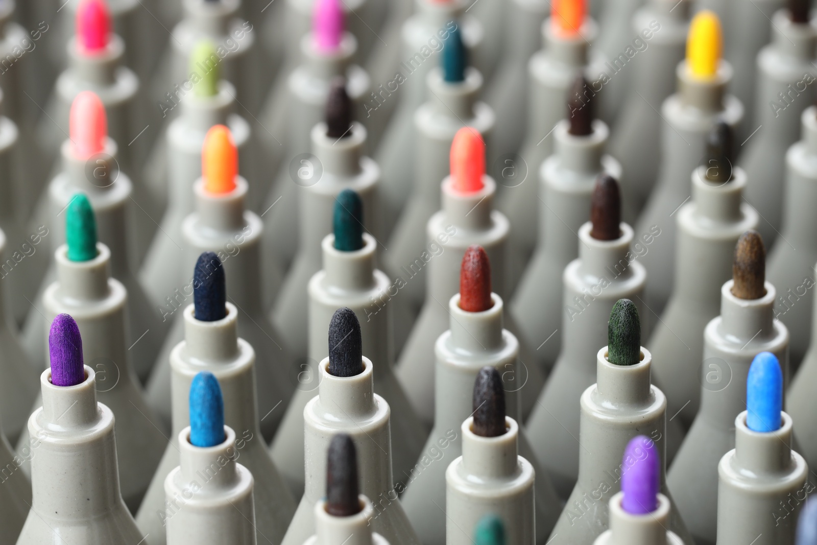 Photo of Many colorful markers as background, closeup. Art supplies